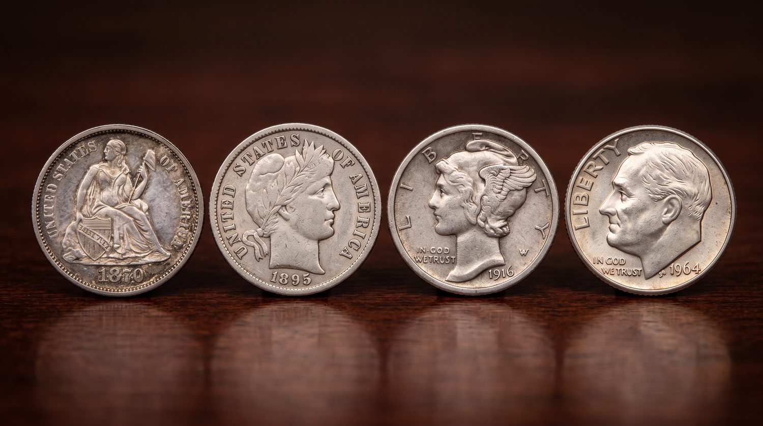 Four historical US silver dimes, 1870, 1895, 1916, 1964, side-by-side
