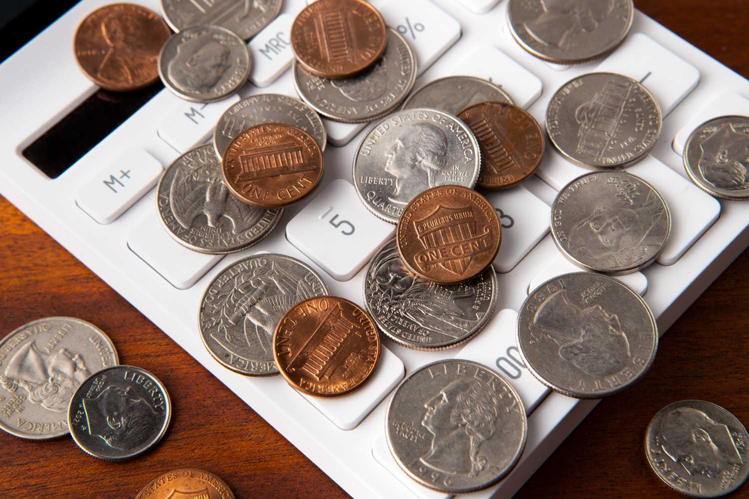 A close-up of a scattered pile of collectible coins